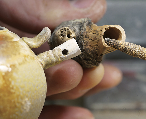 5 Bore out the wooden handle with a burr bit on a flex-shaft rotary tool to the appropriate diameter.