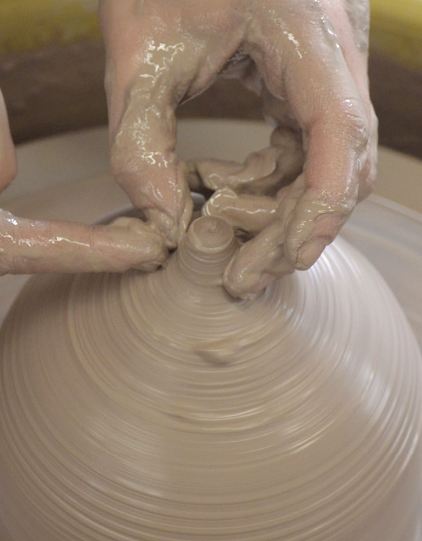 4 Pinch the form closed, leaving a little nub. Pull the nub higher for a longer point.