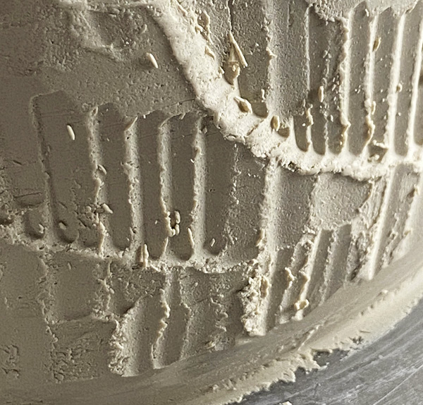 4 If you trim and chatter a piece when it is too wet, the surface will appear fluffy or mushy/undefined.