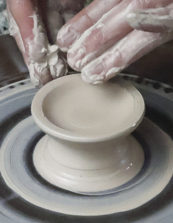 4 Throw the lid upside down on a pedestal. The pedestal will become the finial.