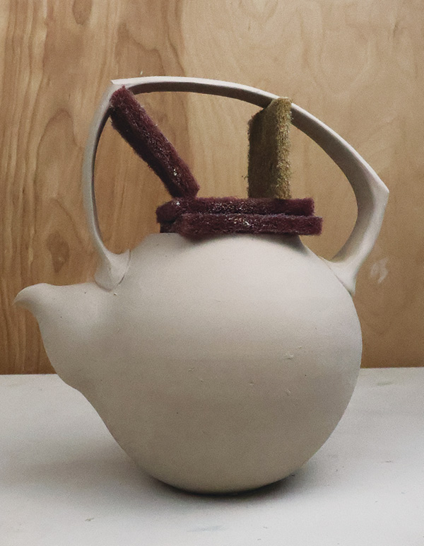15 The completed teapot, leather hard, with all added lugs and support.