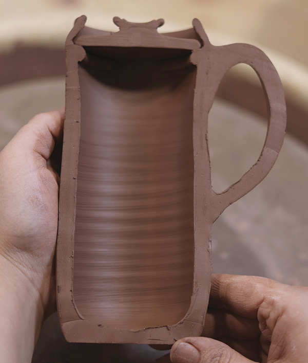 17 A cross-section of the finished mug. Notice the even walls and similar thickness of the handle.