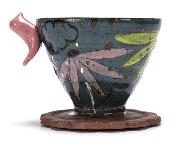 Alec Hoogland's Pour-over, 41/2 in. (11.4 cm) in height. Red stoneware, colored slip, underglaze transfers, fired in an electric kiln to cone 4, lusters.