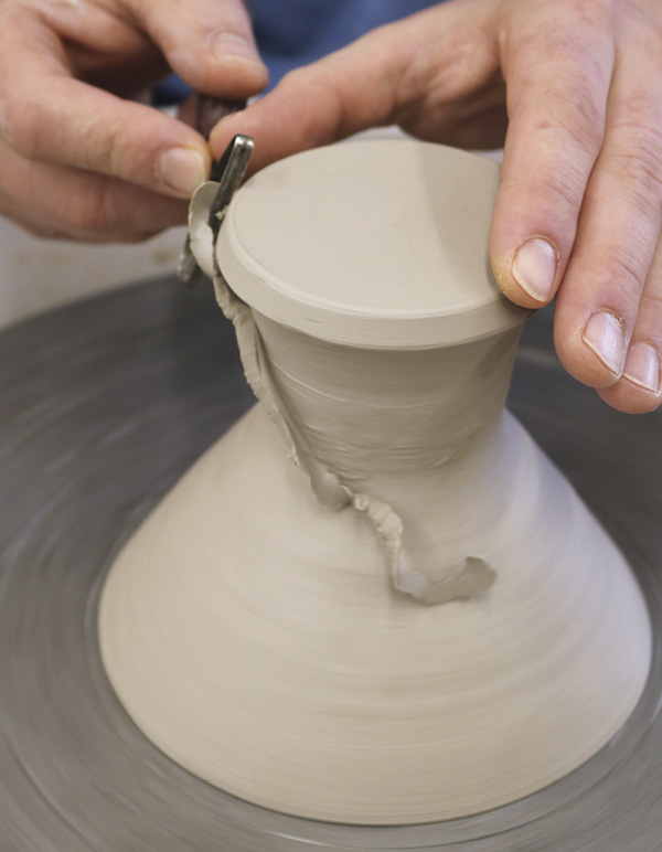 6 Trim the base. The foot should be about half the diameter of the top of the glass.