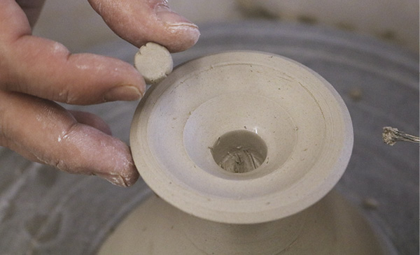 14 Create a small puck, slip and score the puck and the interior of the stem and attach the puck inside the base of the stem, gently press your stamp into the puck of clay.