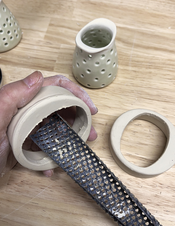 7 Use a Surform to shape the inside to accommodate the strainer’s wings.