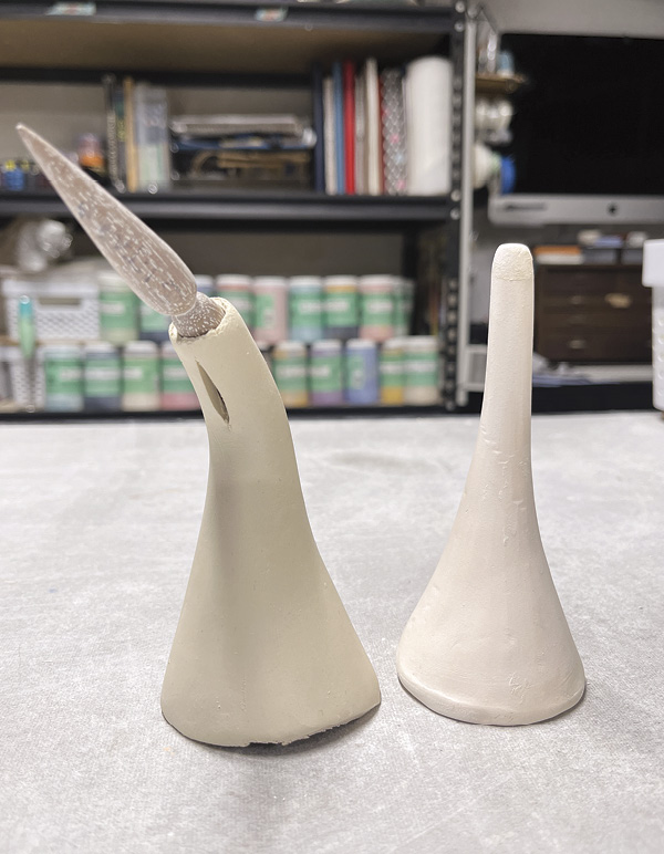 10 Push the spout to curve it, then cut out a dart and curve the tip downward.