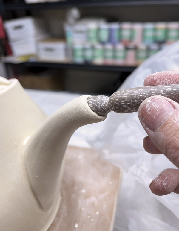 12 Sharpen the spout’s interior edge by twisting a tapered spout maker inside.