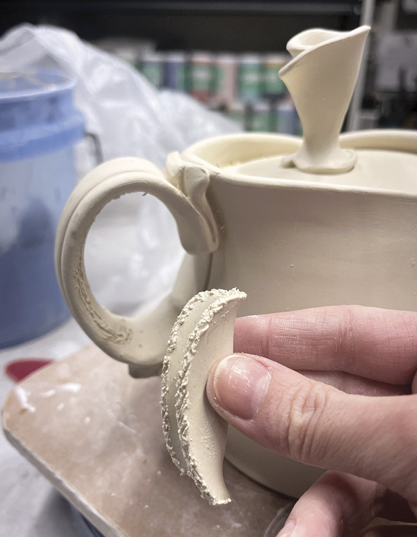 14 Add a thin, potato-chip-shaped slab inside the handle for added comfort.