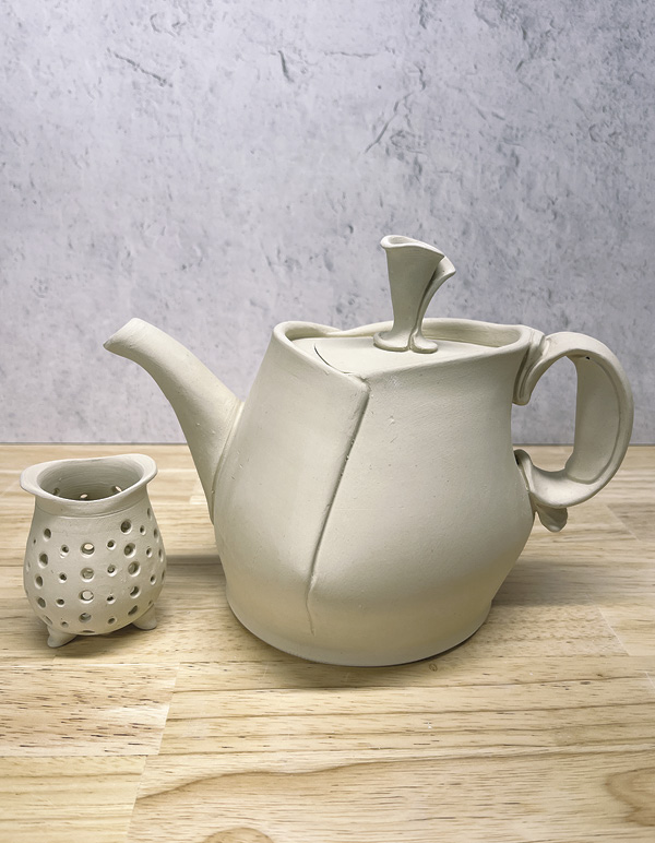 15 Slowly dry the fully constructed teapot and strainer.