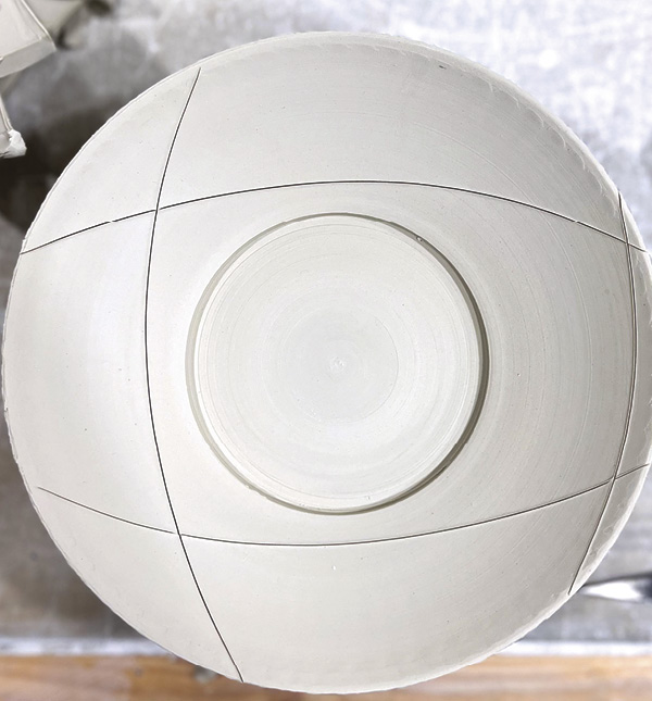 4 Lightly draw an outline of how you want to cut the saucer from the plate shape.