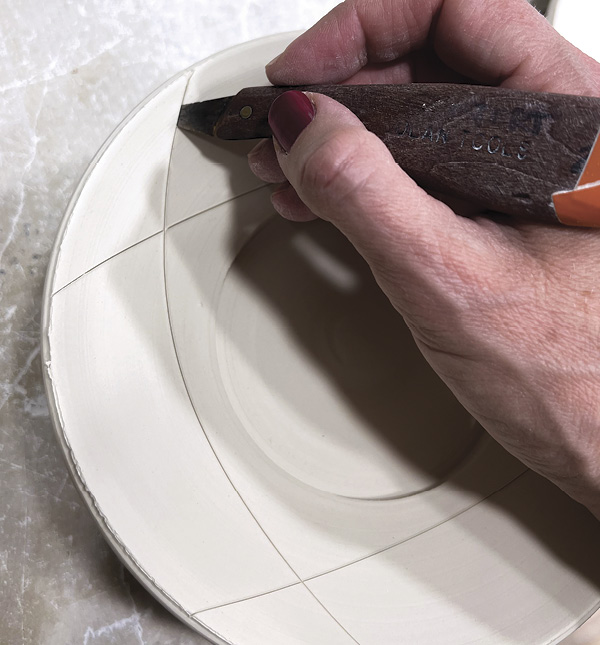 5 Cut away the edges with a sharp knife pointing down and slanted outward.