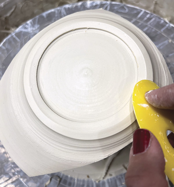 8 Trim a wide, stable foot, and then compress the base and the foot.