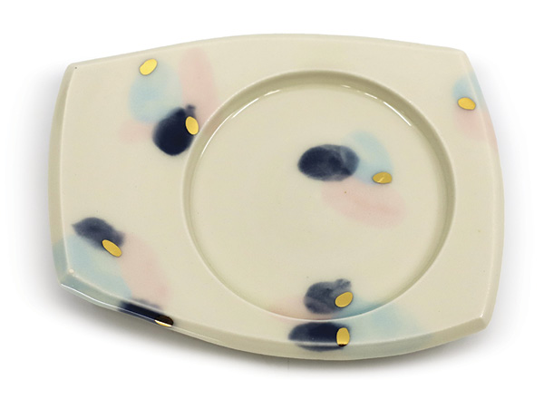 Samantha Hostert's Snack Saucer, 51/2 in. (14 cm) in length, porcelain, glaze fired to cone 6, luster fired to cone 018, 2024.