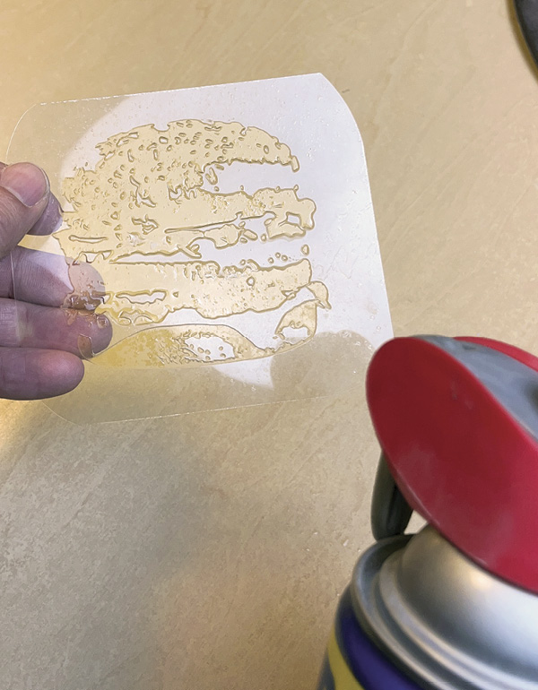 13 Coat a print plate with WD-40 to act as a release agent between surfaces.