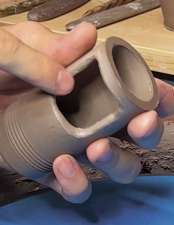 7 Bevel and round the edges of the cut opening. Smooth and clean up edges.