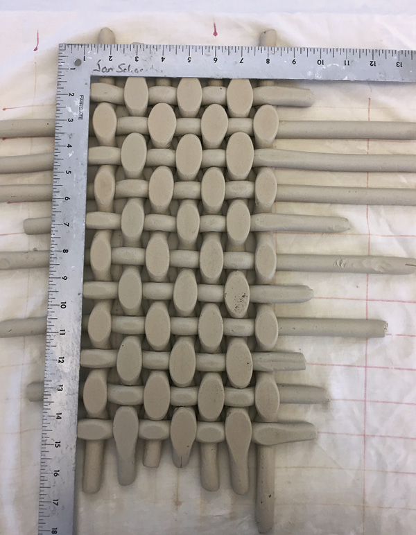 7 Mark the edges of the form using a square and a needle tool.