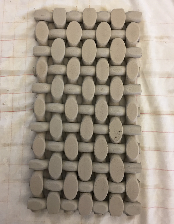 8 Cleanly cut the marked edges with a fettling knife.