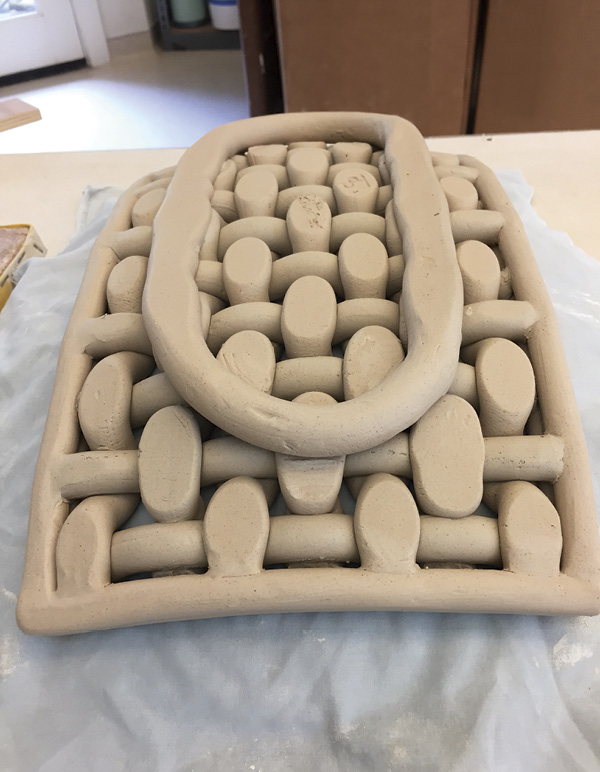 13 Press the foot ring using the cloth-covered board and a level.
