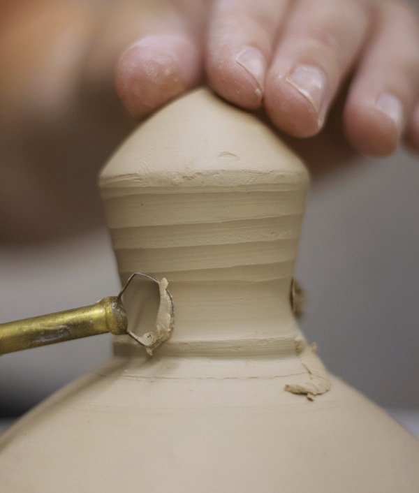 6 Slip, score, and attach the knob to the lid. Trim and refine the shape but don’t trim too much so it can still be carved.