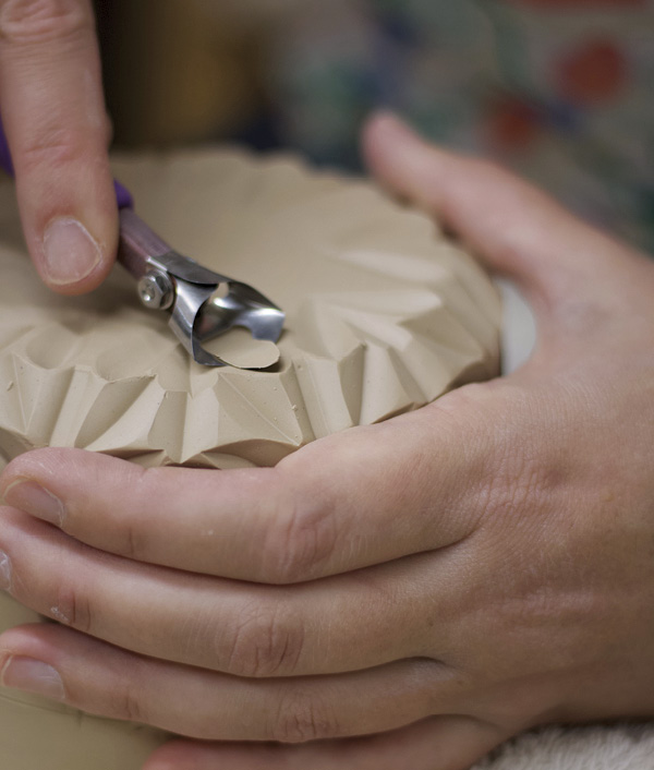12 Carve the entire base, even the bottom. Observe the way the carved marks interact with each other.