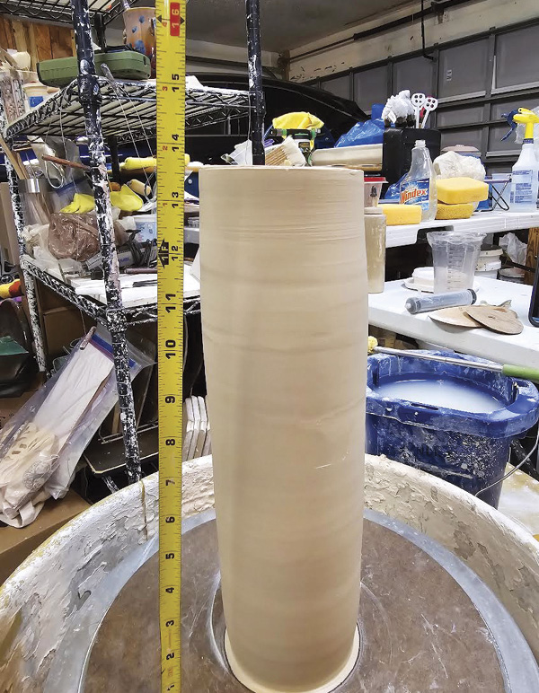 2 Ensure that the inside piece is about 2 inches taller than the outside form.