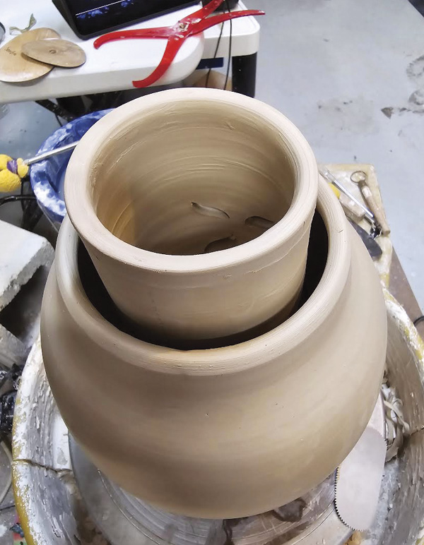 6 Apply slip to the bottom and carefully drop it down the center of the opening.