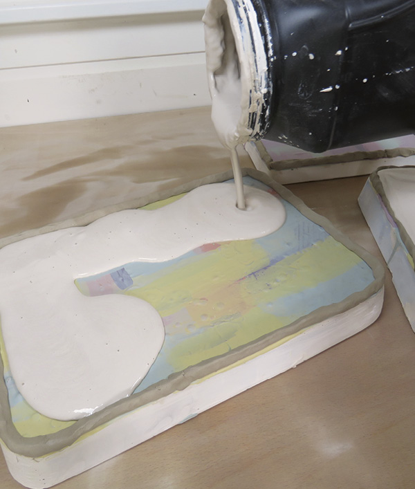 11 Pour the casting slip to a depth of approximately 6 mm. Use the tip of a needle tool to gauge the depth.