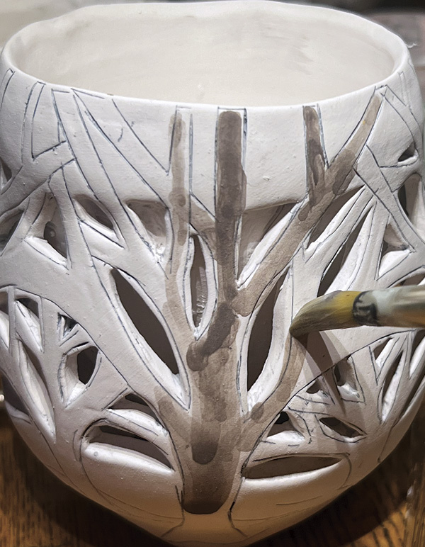 15 Use ceramic watercolors or underglazes to add color and interest to the surface.