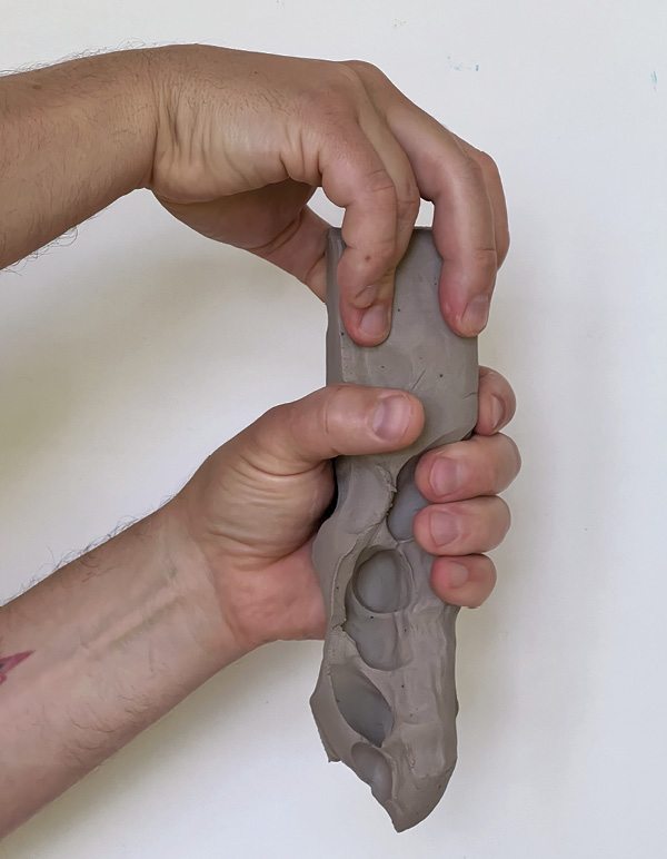 2 Squeeze to lengthen a coil while leaving coarse finger impressions.