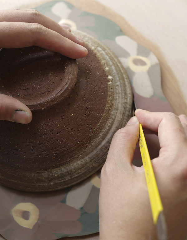 9 Place a round shape in the center and cut out a circle for the mirror opening.