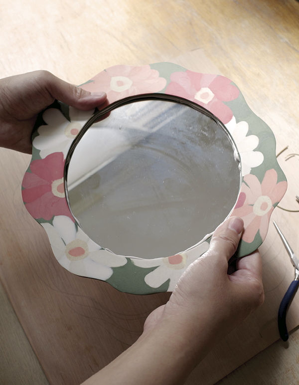 14 After glaze firing, attach the mirror to the back with two-part epoxy.