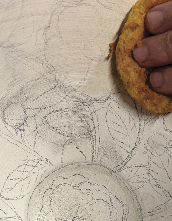 2 Wipe the surface of the drawing to remove any graphite crumbs.