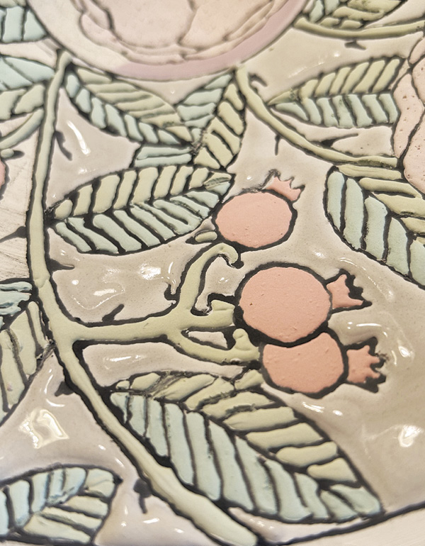 9 Fill in the negative areas with glaze and allow all to dry.