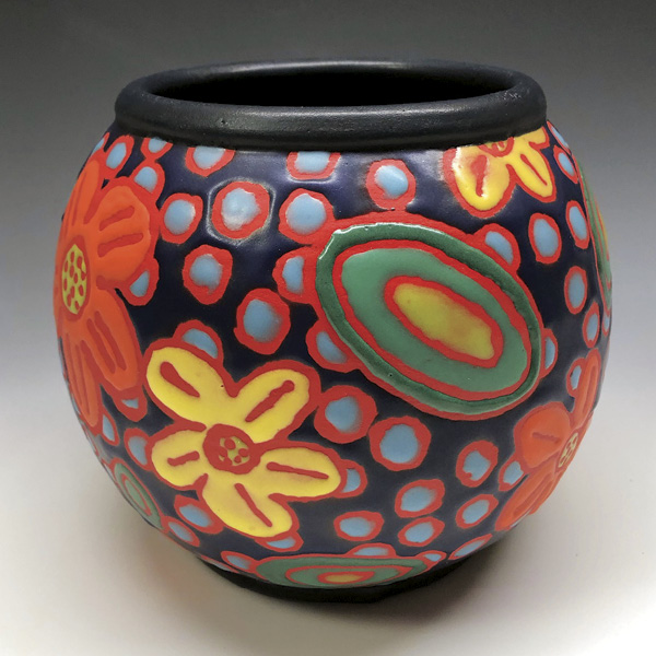 Leslie Messersmith's Space Flowers, 8 in. (20.3 cm) in height, clear wax resist over bisque-fired red underglaze, commercial satin glazes, fired in oxidation to cone 5–6, 2024.