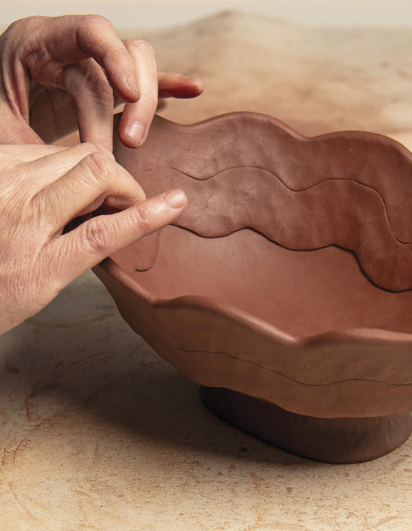 6 Now that the walls are complete, spend some time finishing the lip.