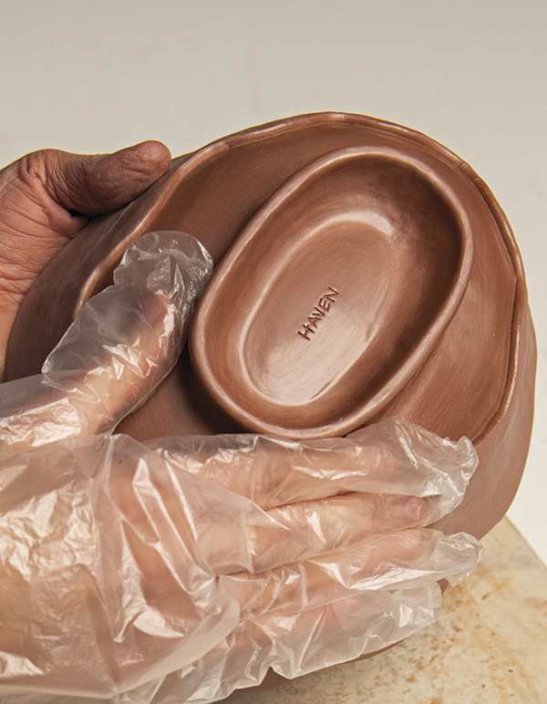 7 A plastic glove makes for a quick but careful burnishing of the terra sigillata.