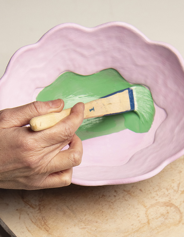 12 Apply Duncan Pure Brilliance (green) over Mayco Matte Transparent (pink).
