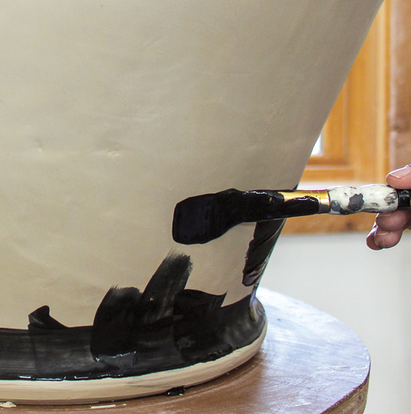 6 Apply underglaze in alternating directions. Let the layers dry between coats.
