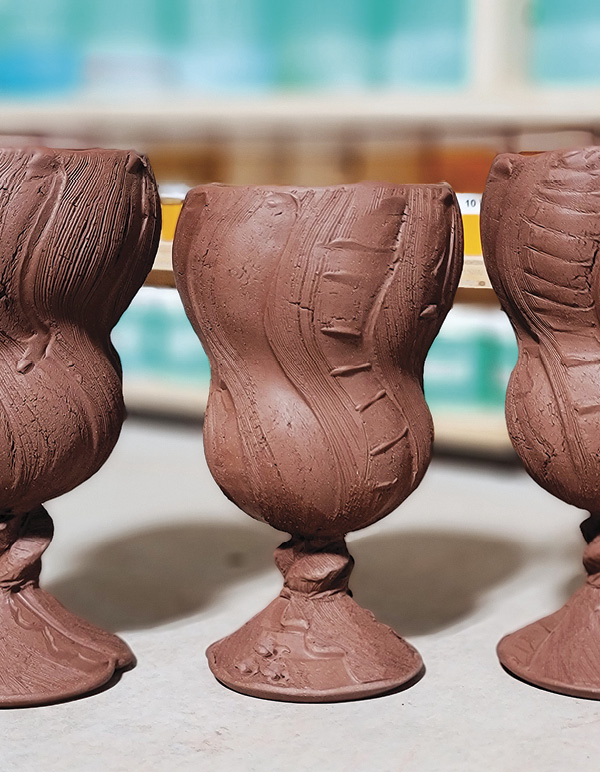 1 Throw, alter, and texture several cups. Dry then bisque fire them.
