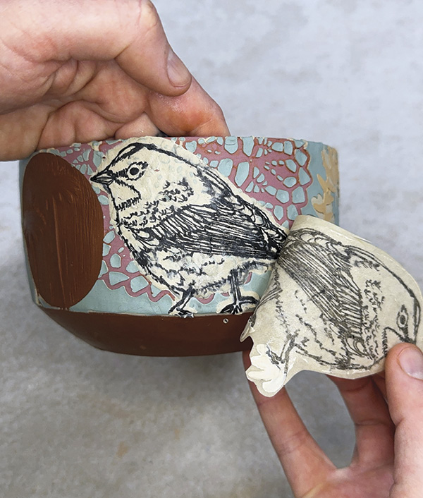 17 Gently and slowly peel back the transfer to reveal the image.