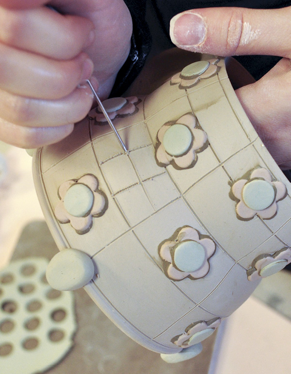 9 Create a more patchwork feel by further dividing the carved squares.