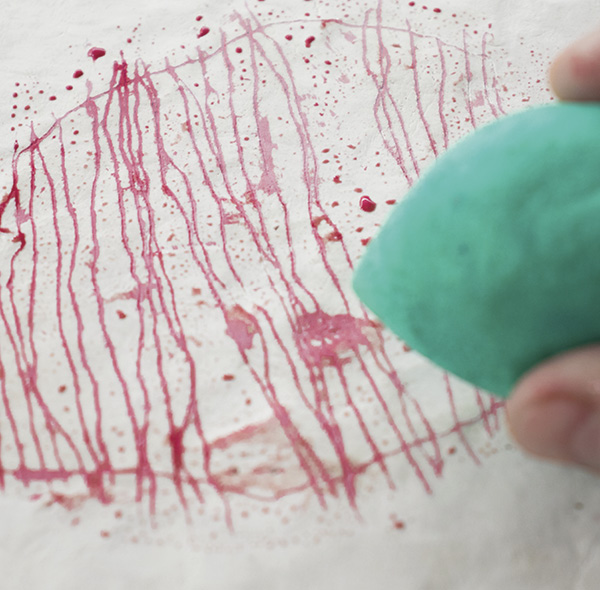4 Wipe away excess underglaze using soft makeup-blending sponge to reveal the delicate inlaid lines below.