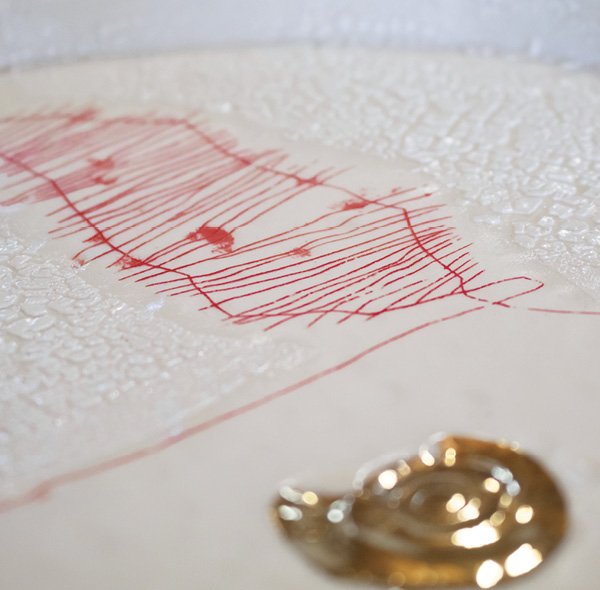 5 Once fired, the line work is embedded into the surface of the piece, and almost imperceptible to the touch.