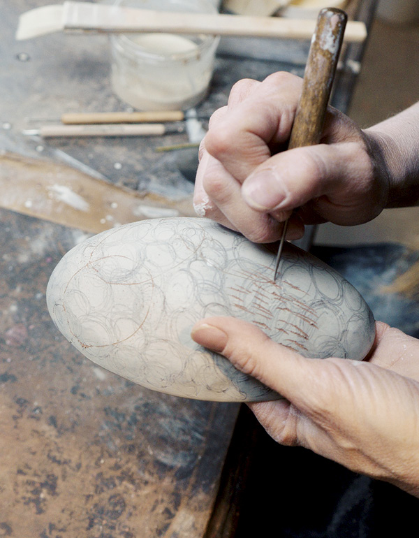 4 Use a needle tool to scratch delicate lines and hatch-like marks.