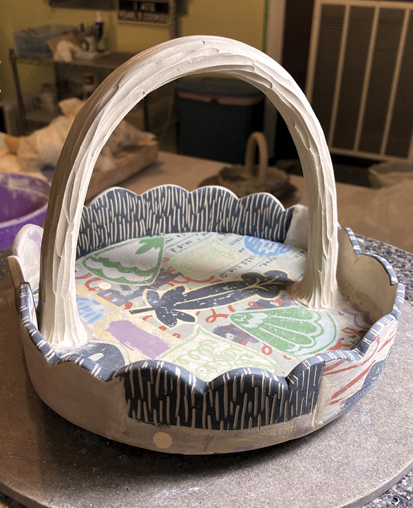 24 Add some sgraffito texture to the sides of the basket. Dry and fire.