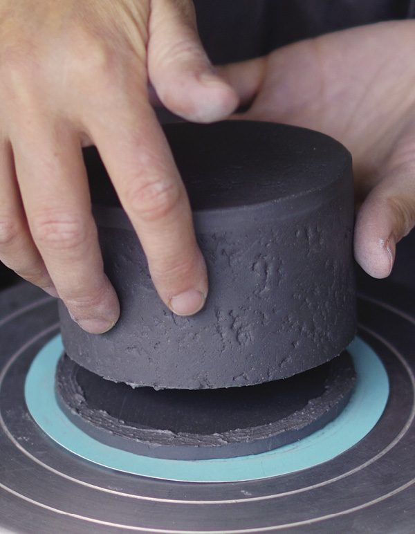 6 Turn the open cylinder over and attach the other textured circle.