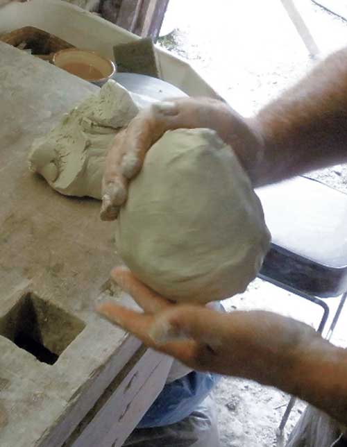 The cone shape produced has no edges and a nice rounded base to it. This process makes the centering of a larger mass of clay much easier. It is well worth taking a little time to do it.