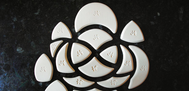A selection of handmade pottery throwing ribs made out of clay.