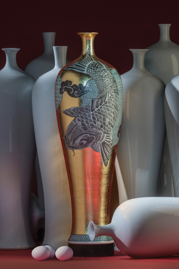 1. Melanie Sherman’s Vase with Koi, 26 in. (66 cm) in length, porcelain, glaze, luster, mixed media, and found objects, 2015. Photo: EG Schempf. 